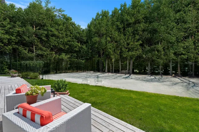 a view of backyard with furniture and garden