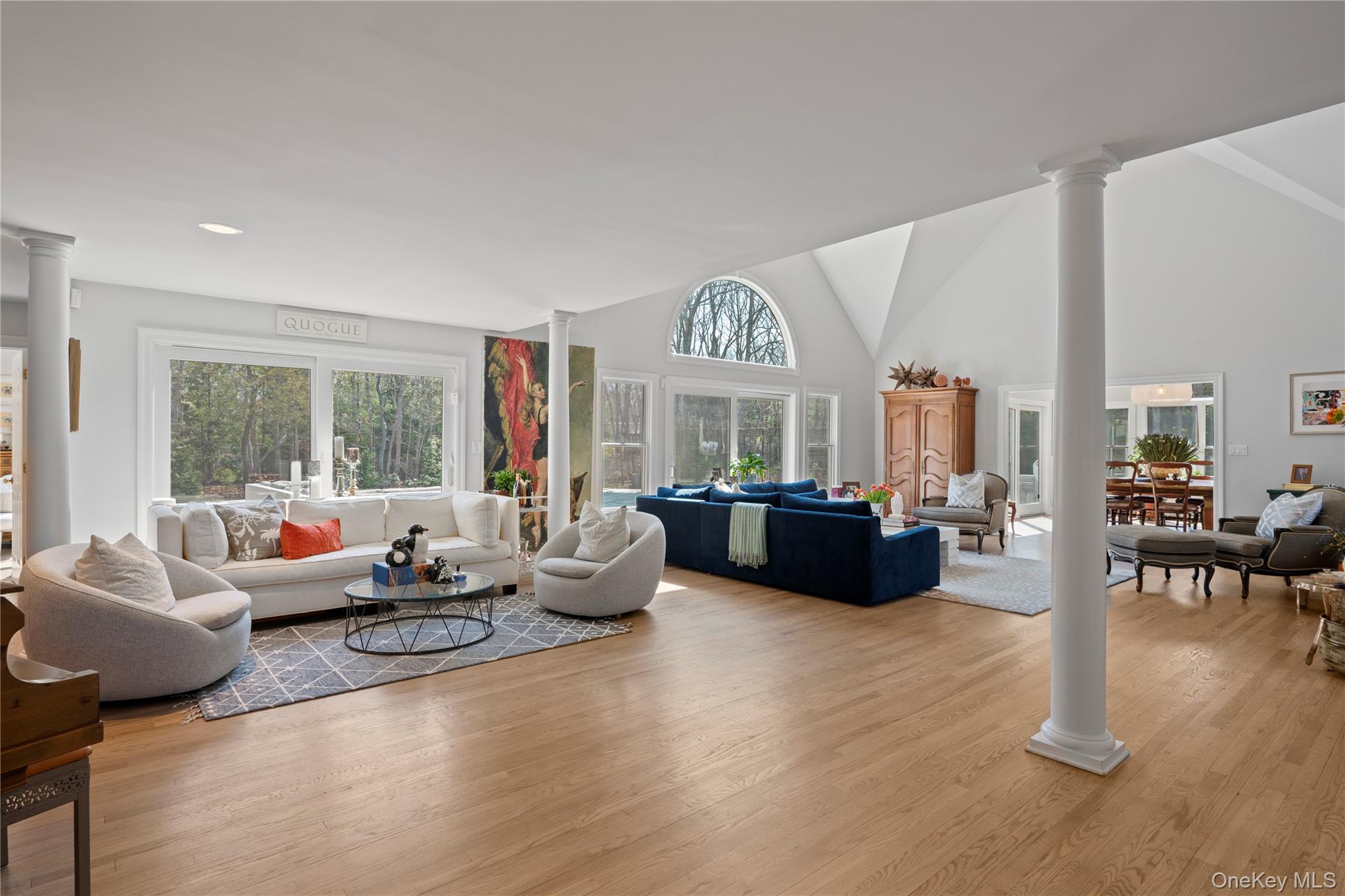 38 Pheasant Run Quogue, NY 11959 - Photo 5 of 35 a living room with furniture and a large window