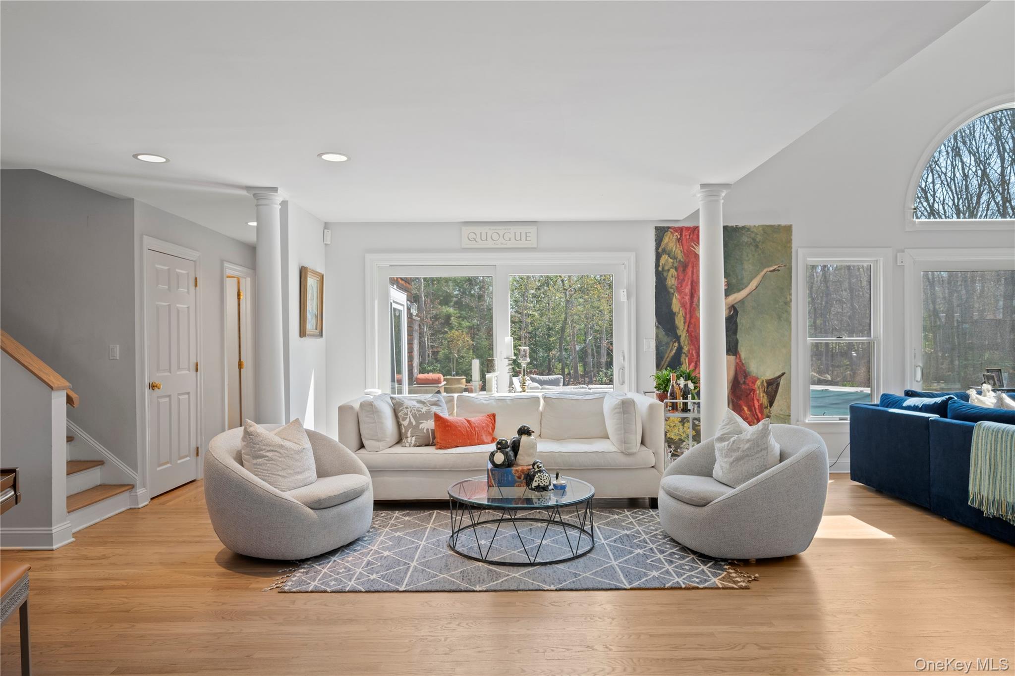 38 Pheasant Run Quogue, NY 11959 - Photo 6 of 35 a living room with furniture and a large window