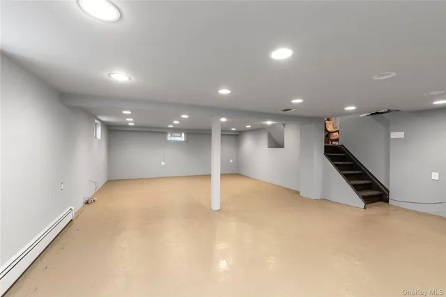 an empty room with wooden floor