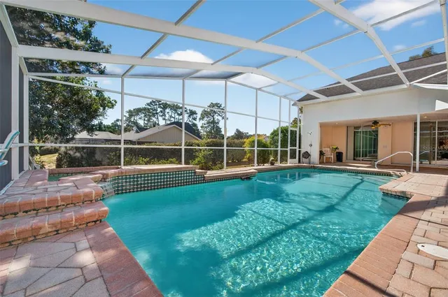 a view of yard with large trees