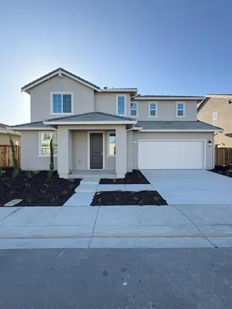a front view of a house with entertaining space
