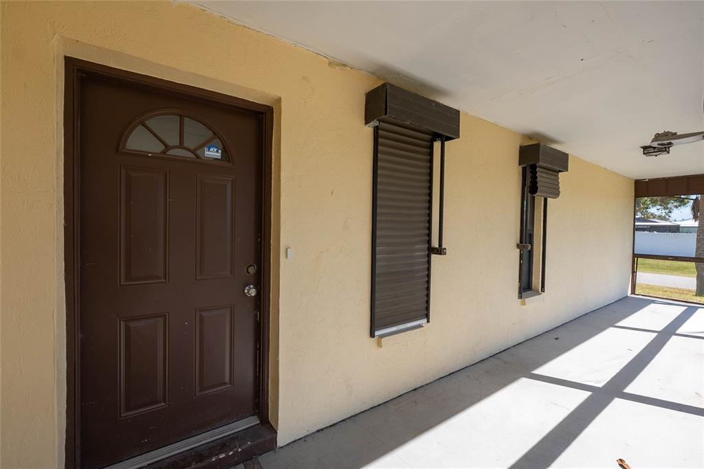 7450 Ebro Road Englewood, FL 34224 - Photo 8 of 24 wraparound porch