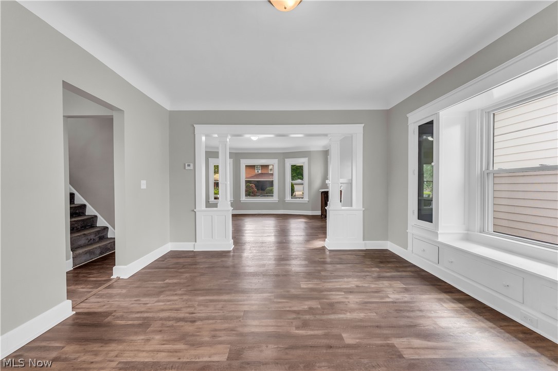 3506 Riverside Avenue Cleveland, OH 44109 - Photo 12 of 31 Spacious interior featuring wood-finish flooring, light gray wall paint, and white trim