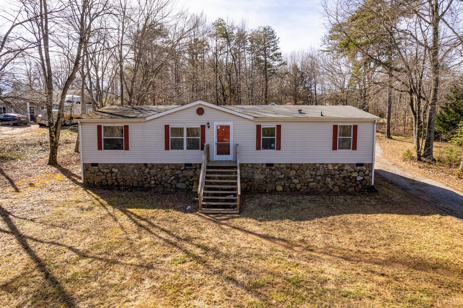 1274 English Tavern Road Rustburg, VA 24588 - Photo 1 of 43 front view of a house with a yard