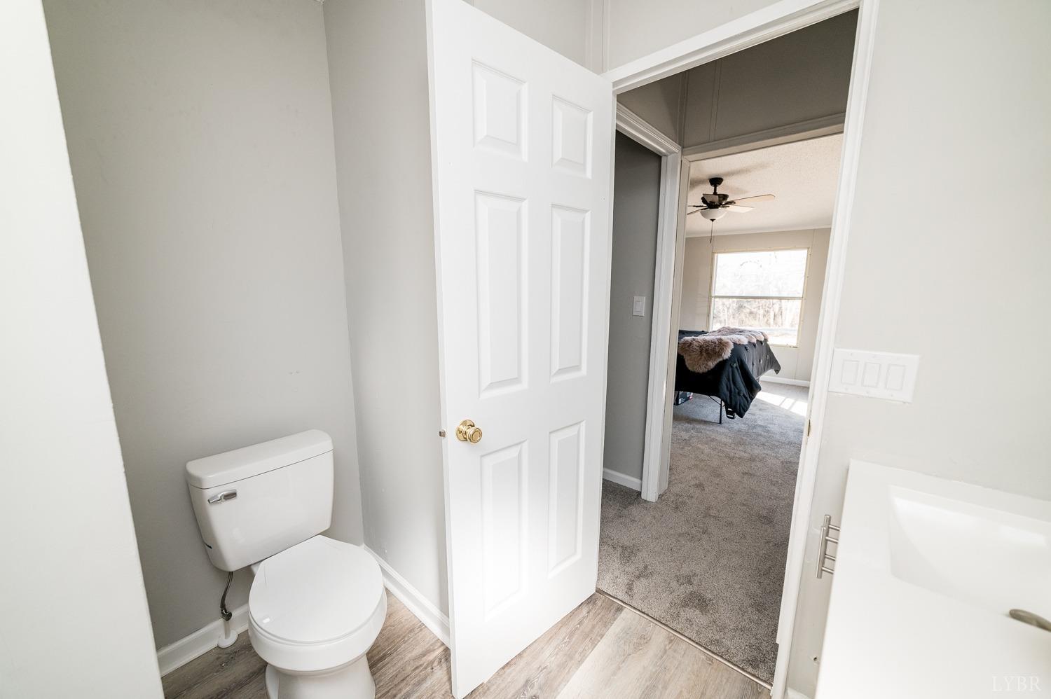 1274 English Tavern Road Rustburg, VA 24588 - Photo 11 of 43 a bathroom with a toilet and a shower
