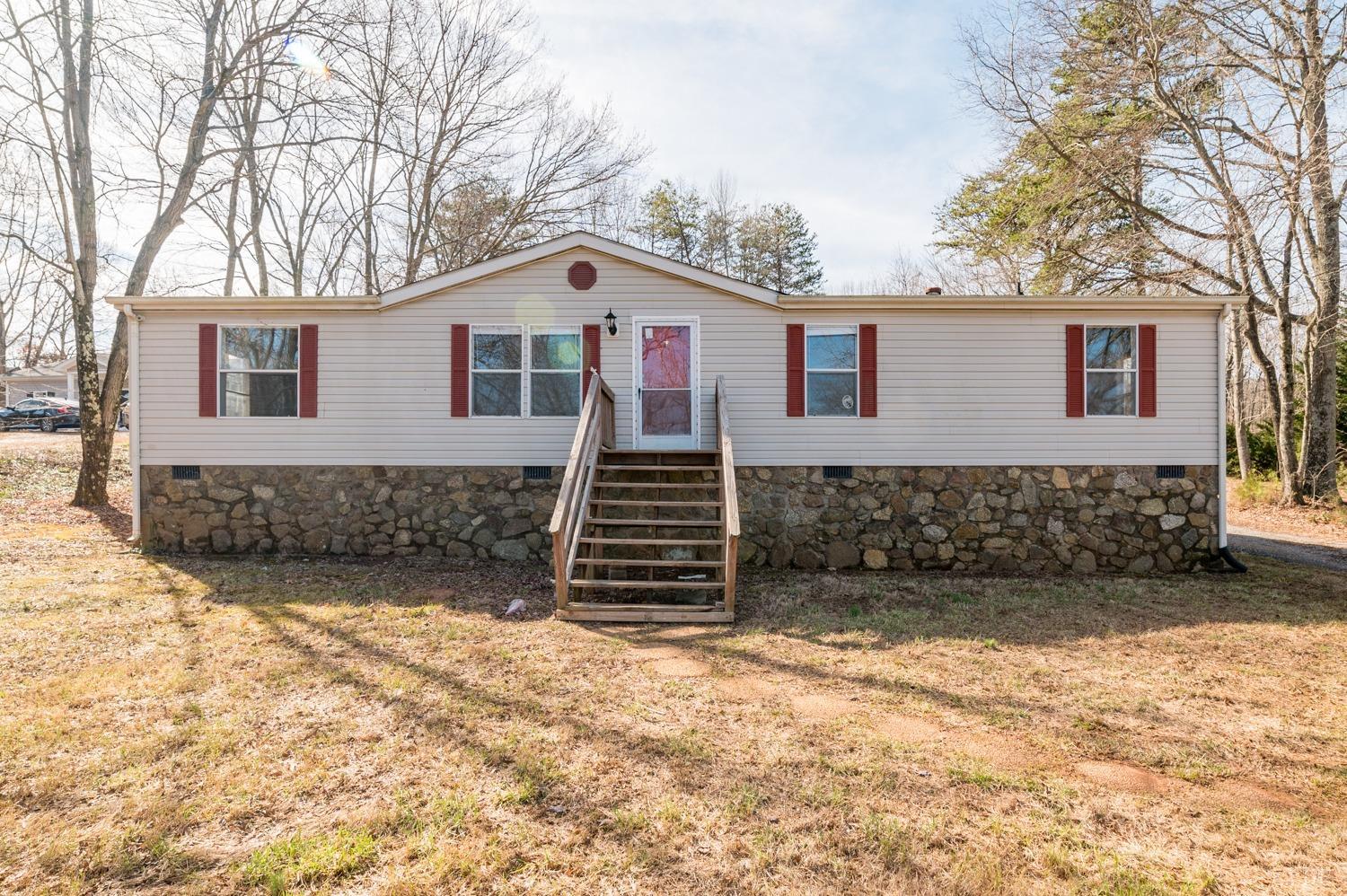 1274 English Tavern Road Rustburg, VA 24588 - Photo 28 of 43 a front view of a house with a yard
