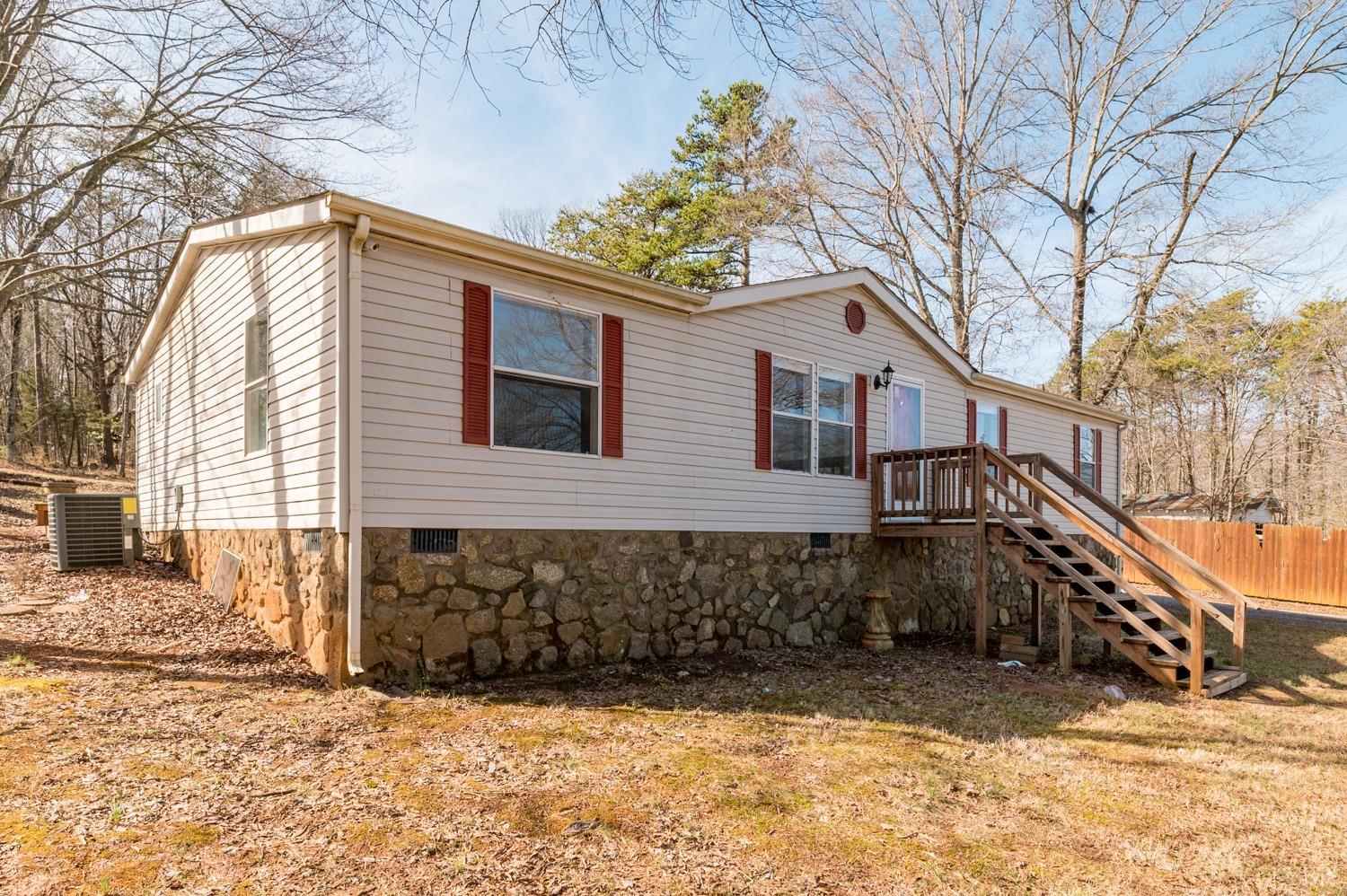1274 English Tavern Road Rustburg, VA 24588 - Photo 29 of 43 a front view of a house with a yard