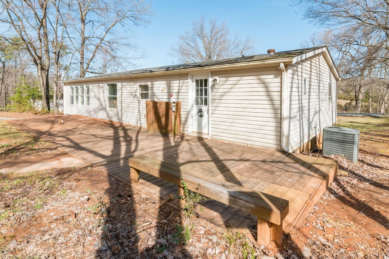 1274 English Tavern Road Rustburg, VA 24588 - Photo 31 of 43 a view of a house with a backyard