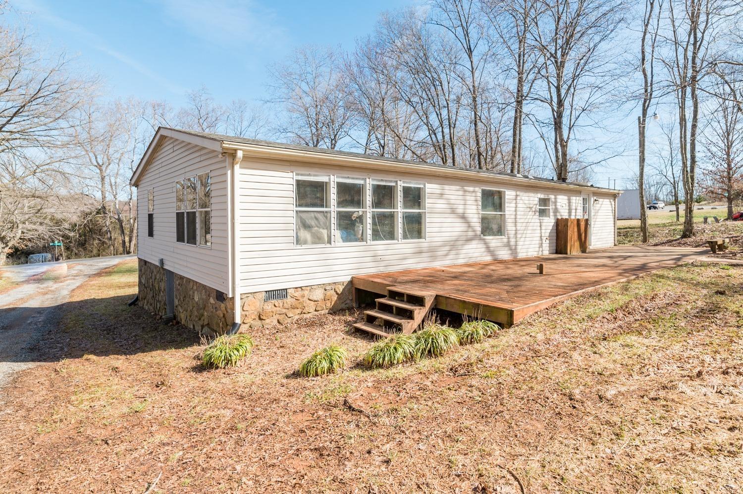 1274 English Tavern Road Rustburg, VA 24588 - Photo 37 of 43 a front view of a house with a yard