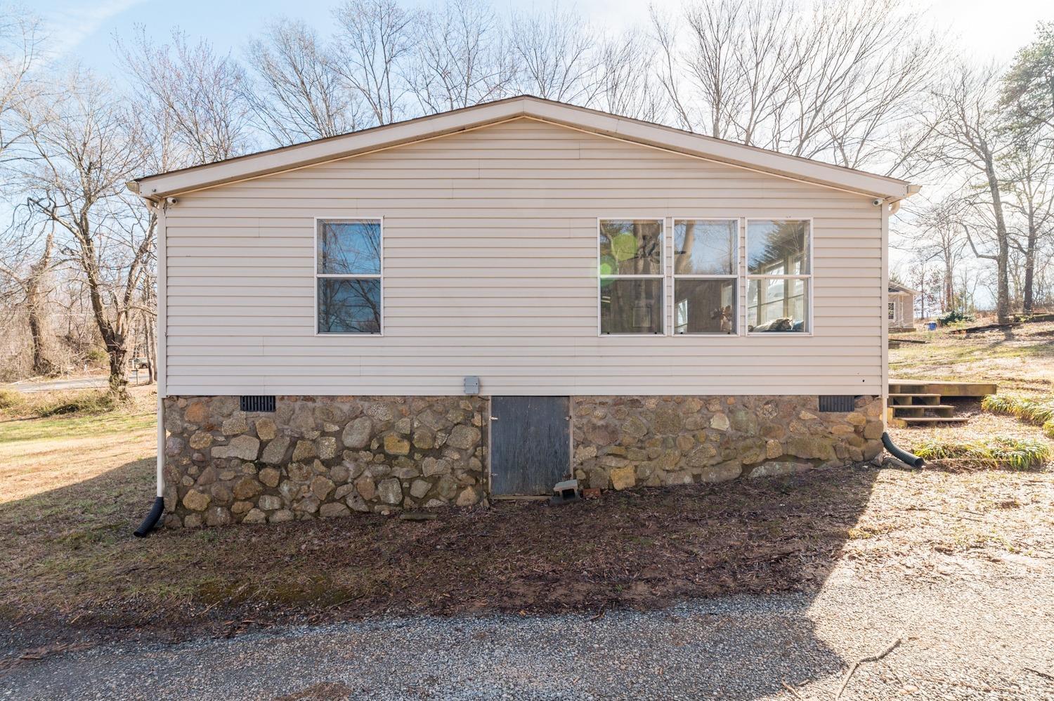 1274 English Tavern Road Rustburg, VA 24588 - Photo 38 of 43 a view of a house with a yard