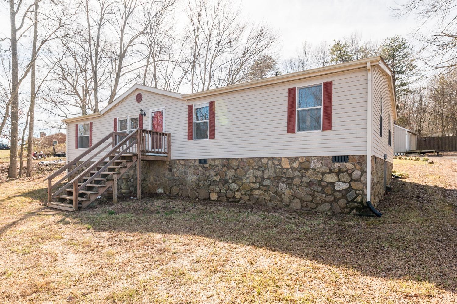 1274 English Tavern Road Rustburg, VA 24588 - Photo 39 of 43 a view of a house with a yard