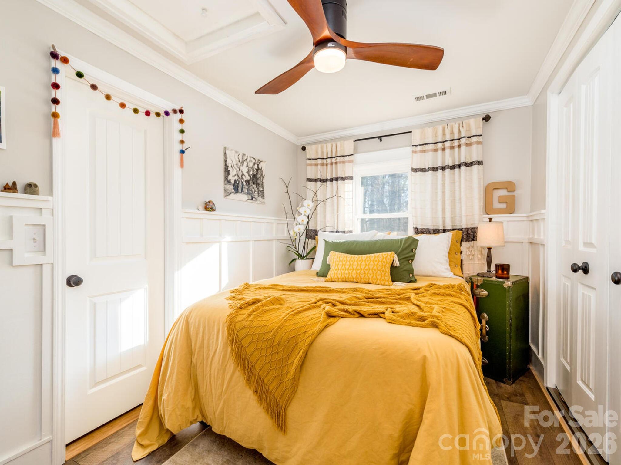 29 White Oak Road Arden, NC 28704 - Photo 21 of 42 a bed room with a bed and a chair