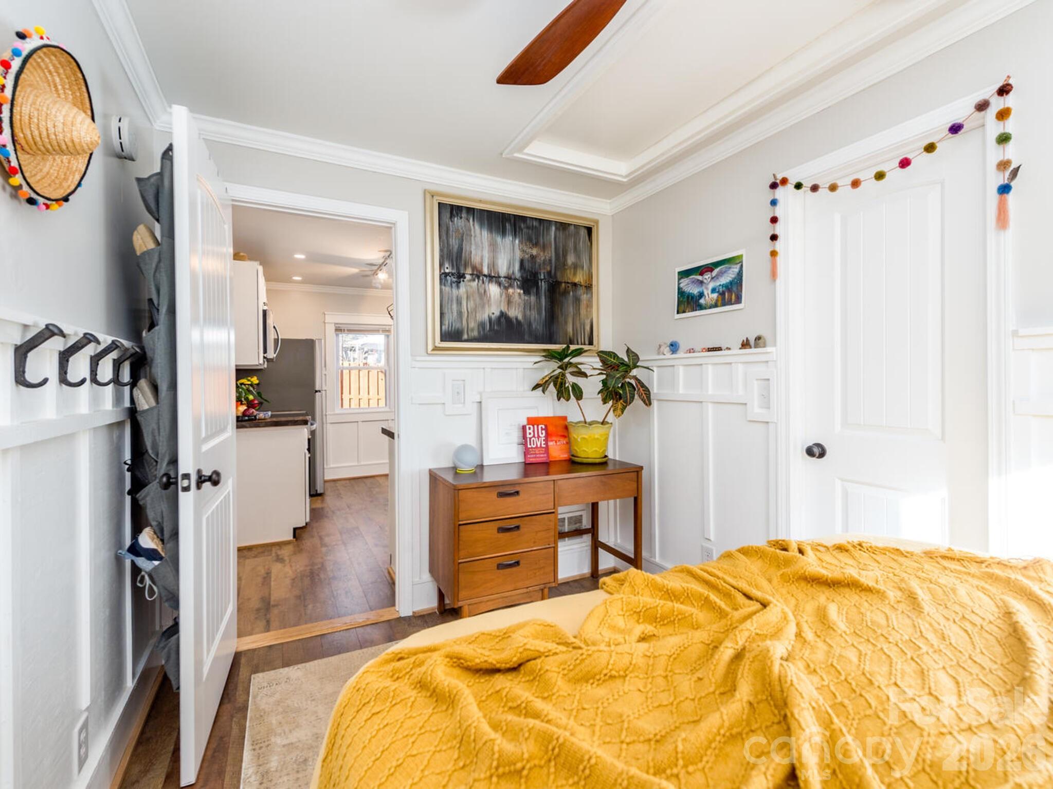 29 White Oak Road Arden, NC 28704 - Photo 22 of 42 a bed room with a bed and a mirror