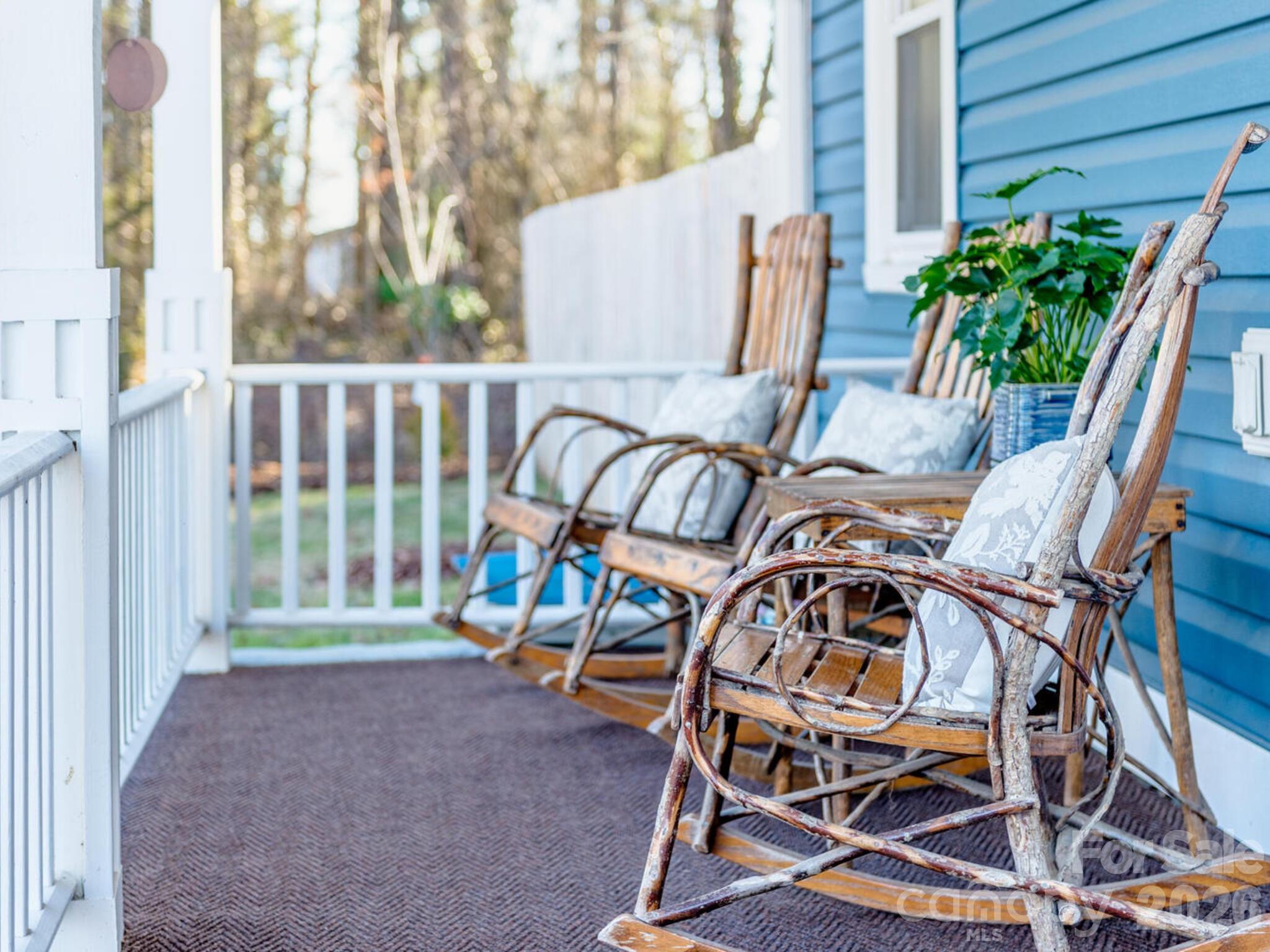29 White Oak Road Arden, NC 28704 - Photo 3 of 42 a view of a patio with a table and chairs