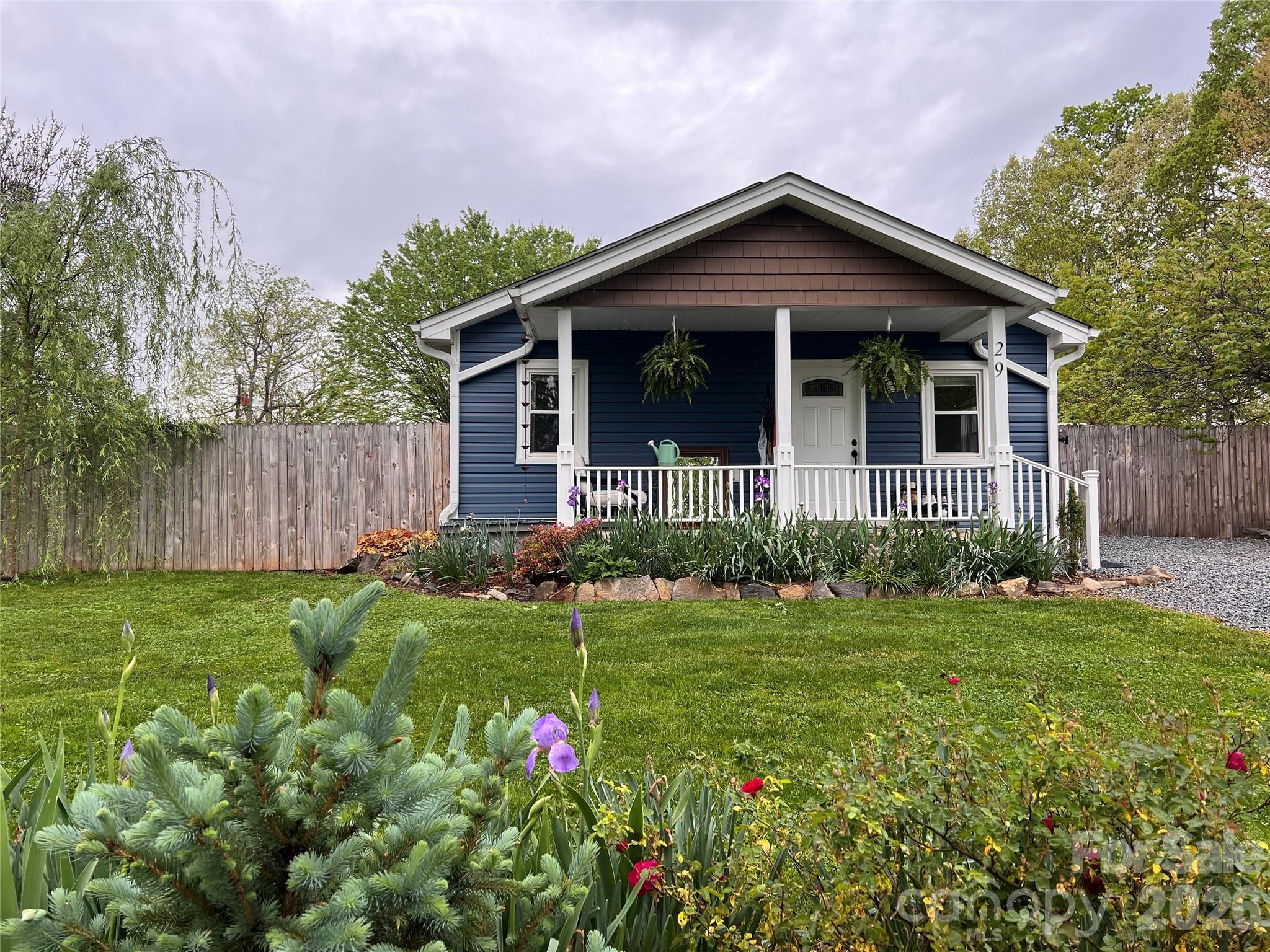29 White Oak Road Arden, NC 28704 - Photo 40 of 42 a front view of a house with a yard