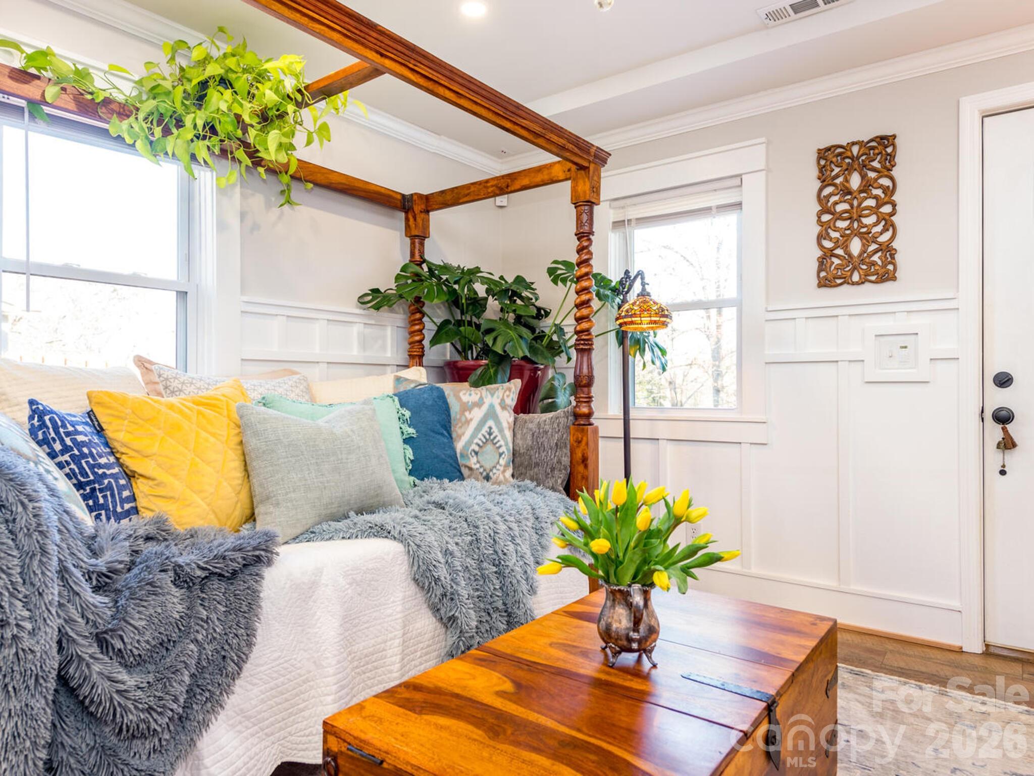 29 White Oak Road Arden, NC 28704 - Photo 6 of 42 a living room with furniture flowerpot and a potted plant