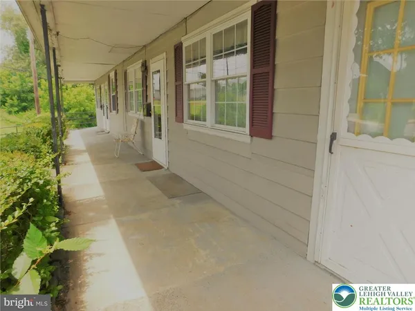 a view of a house with a porch