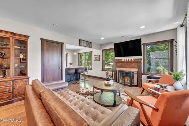 a living room with furniture and a window