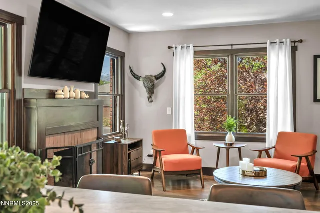 a work room with furniture and a window