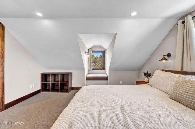 a bathroom with a sink a mirror and a shower
