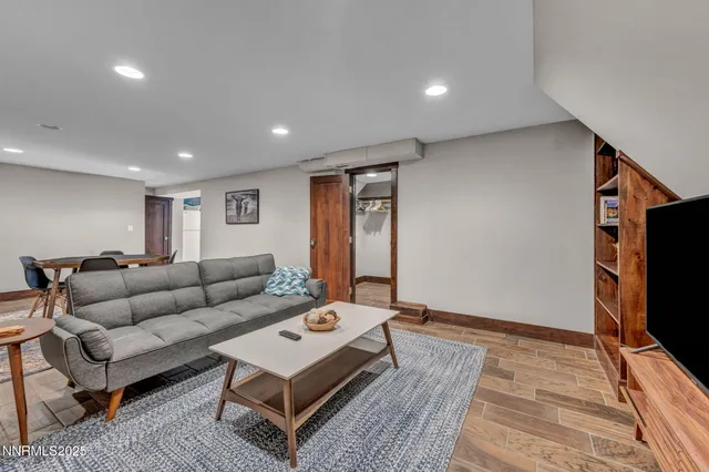 a bedroom with a bed and a view of walk in closet