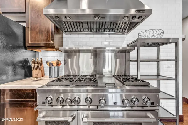 a view of a dining room with furniture and window