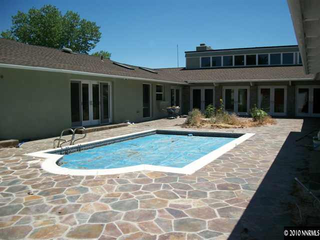 1665 Wendy Way Reno, NV 89509 - Photo 9 of 9 a view of a house with backyard and sitting area