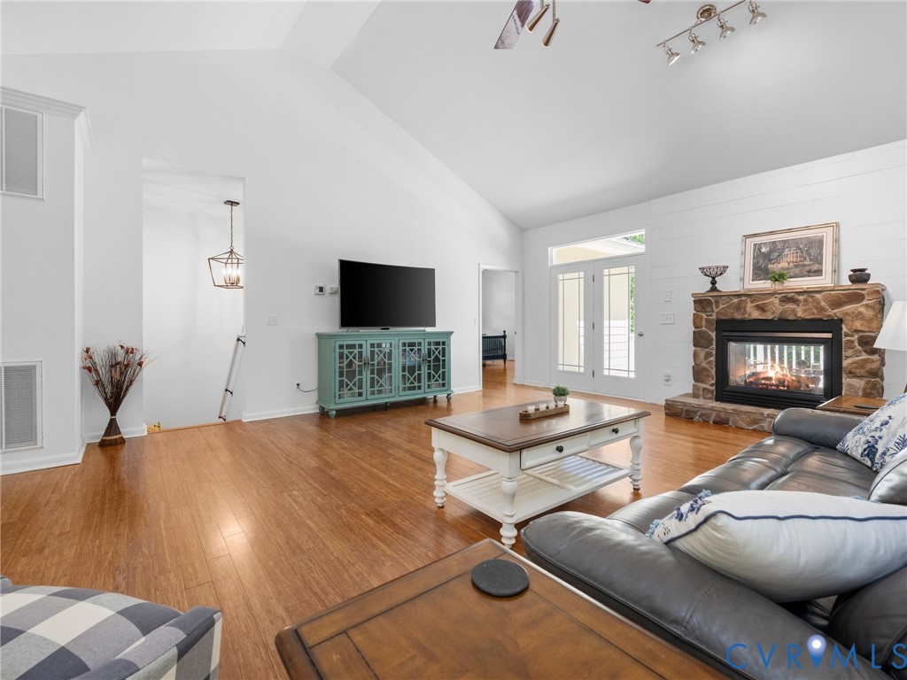 6126 Autumn Bluff Road Powhatan, VA 23139 - Photo 15 of 47 a living room with furniture and a flat screen tv