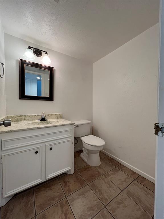 1908 Camden Court, Unit 3 Denton, TX 76205 - Photo 9 of 17 Hall Bath downstairs