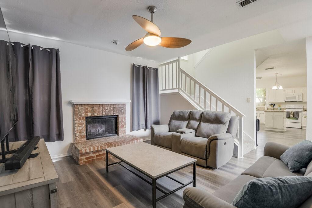 5428 Rolling Green Road Arlington, TX 76017 - Photo 9 of 29 Gorgeous flooring has been updated! Family room is open and inviting