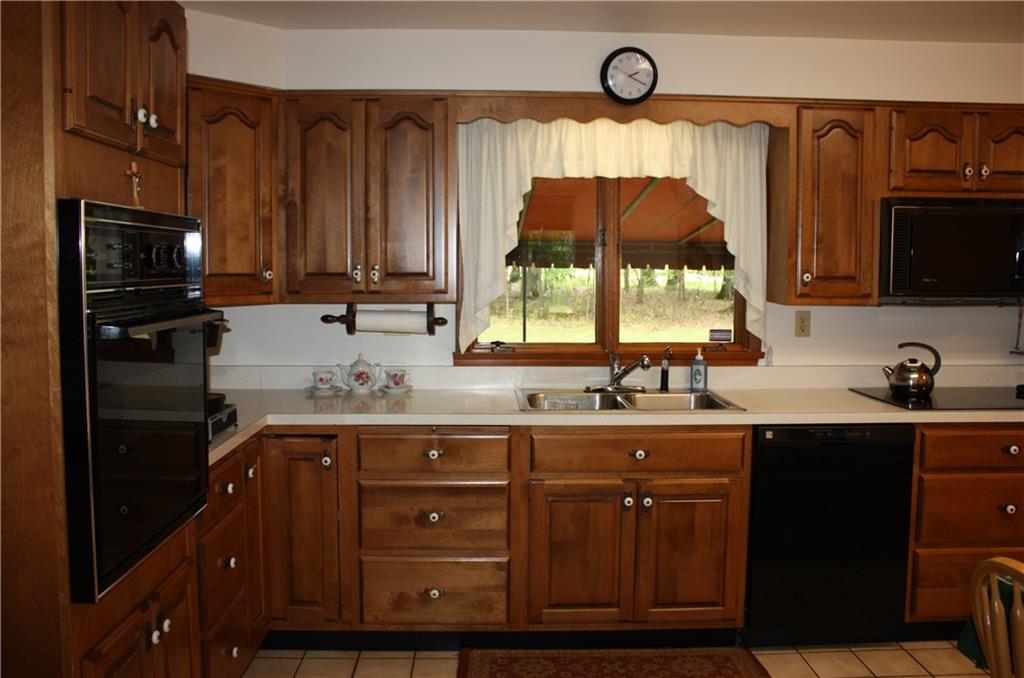 350 Sawmill Run Road Butler, PA 16001 - Photo 14 of 25 Kitchen with built in oven and electric cook top