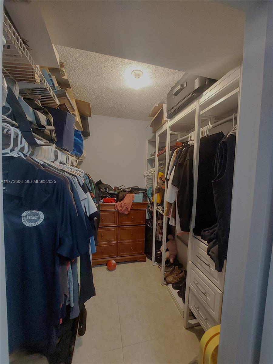 16300 Golf Club Road, Unit 317 Weston, FL 33326 - Photo 9 of 41 Master Walking Closet