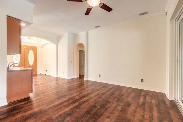 a view of an empty room with a window