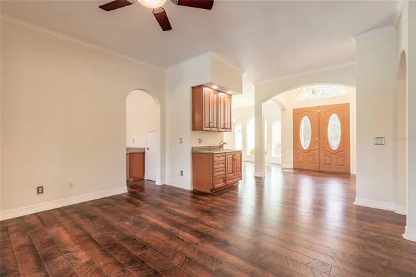 a view of an empty room with a window
