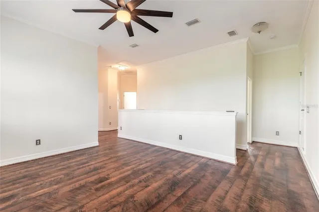 an aerial view of a house with a lake view