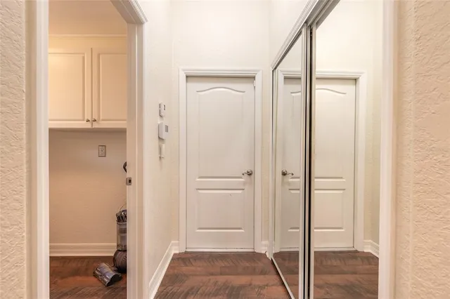 an aerial view of residential houses with outdoor space and river