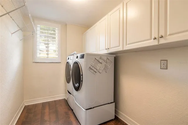 an aerial view of a house with a lake view
