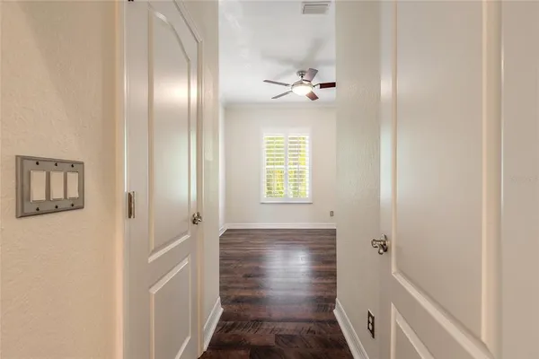 a view of a swimming pool and an buildings in the background
