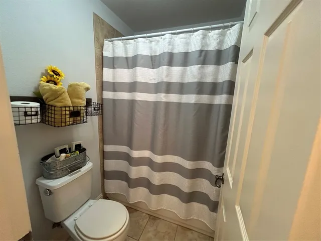 a bathroom with a sink and toilet
