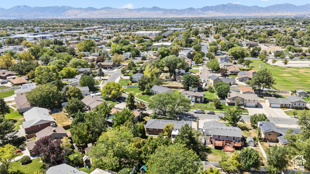 8843 Capernaum Road West Jordan, UT 84088 - Photo 30 of 31 Aerial perspective of suburban area with a mountain backdrop