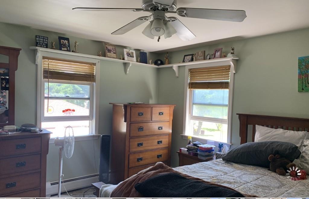 1225 Reed Road Dartmouth, MA 02747 - Photo 11 of 21 a bedroom with a bed and a window