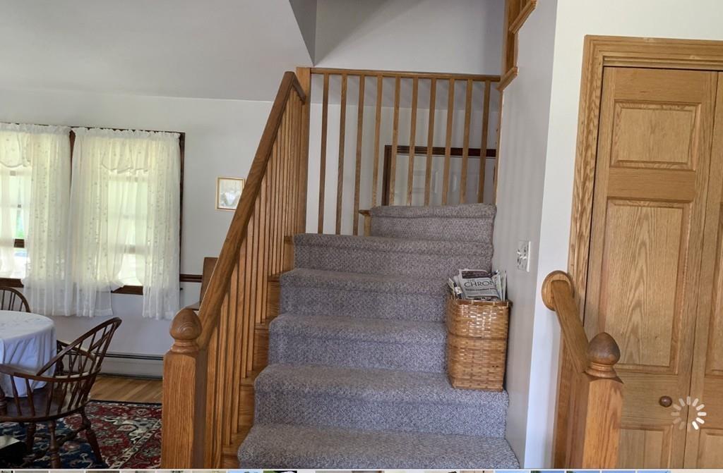 1225 Reed Road Dartmouth, MA 02747 - Photo 16 of 21 a view of entryway and hall with wooden floor