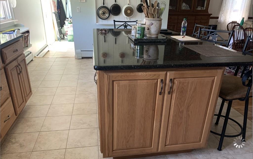 1225 Reed Road Dartmouth, MA 02747 - Photo 7 of 21 a kitchen with a sink and cabinets
