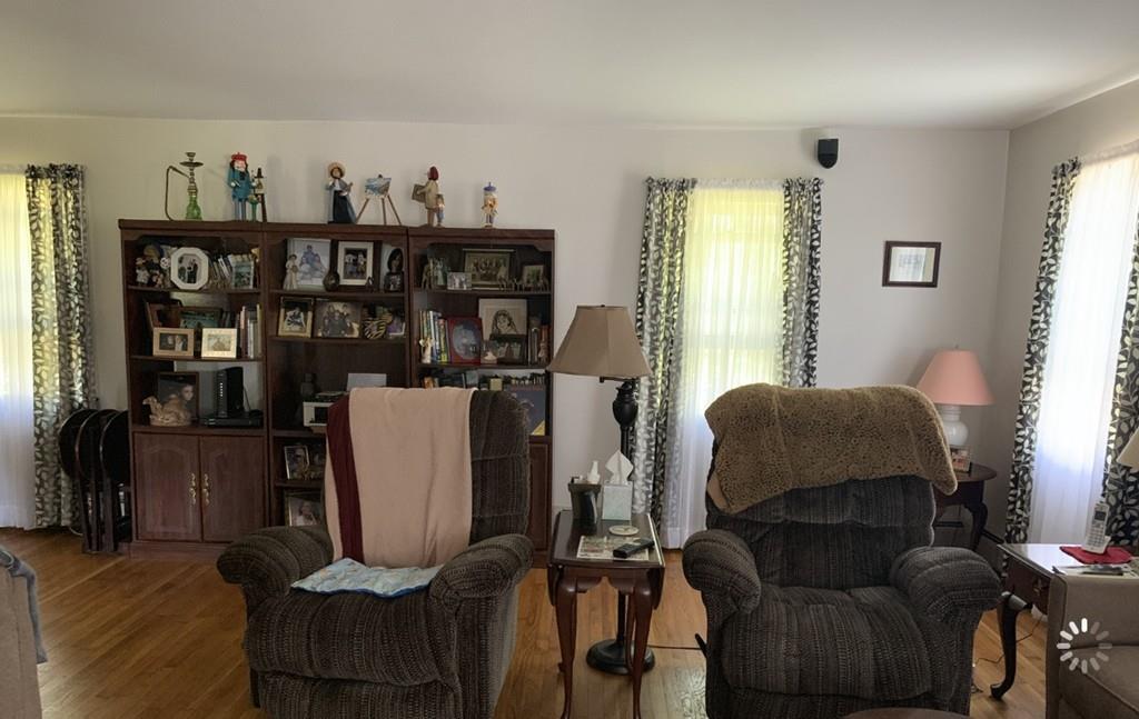 1225 Reed Road Dartmouth, MA 02747 - Photo 8 of 21 a living room with furniture a window and a flat screen tv