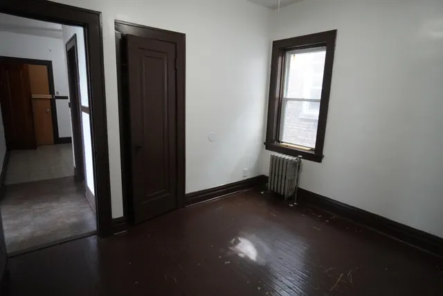 an empty room with windows