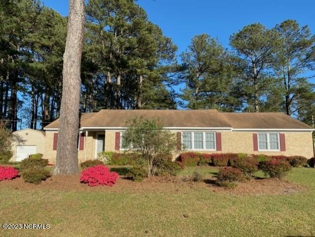 1013 Tar Heel Road South Wilson, NC 27893 - Photo 1 of 13 Lovely Landscape