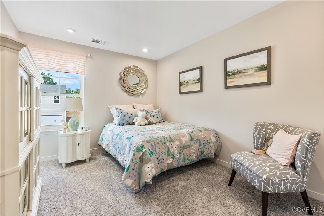 38 Central Place Aylett, VA 23009 - Photo 29 of 32 a spacious bedroom with a bed and a couch