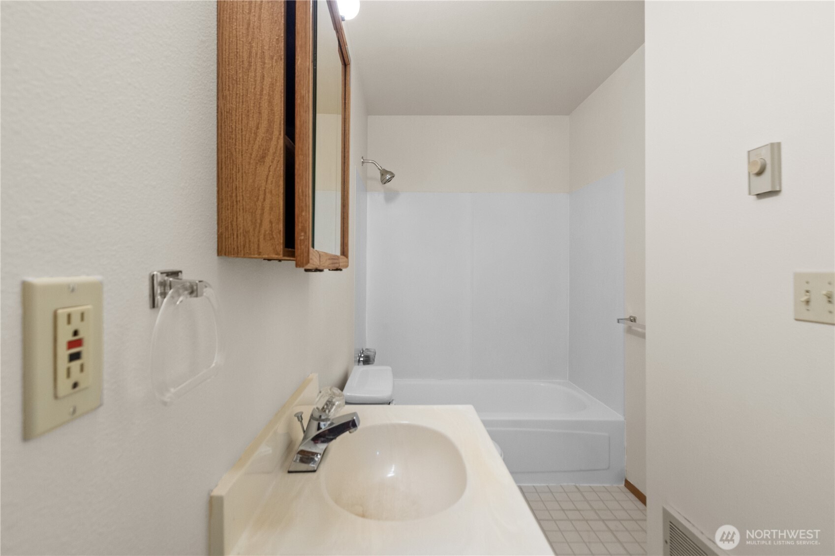 2312 Jade Avenue Everett, WA 98201 - Photo 15 of 34 a bathroom with a sink and a mirror
