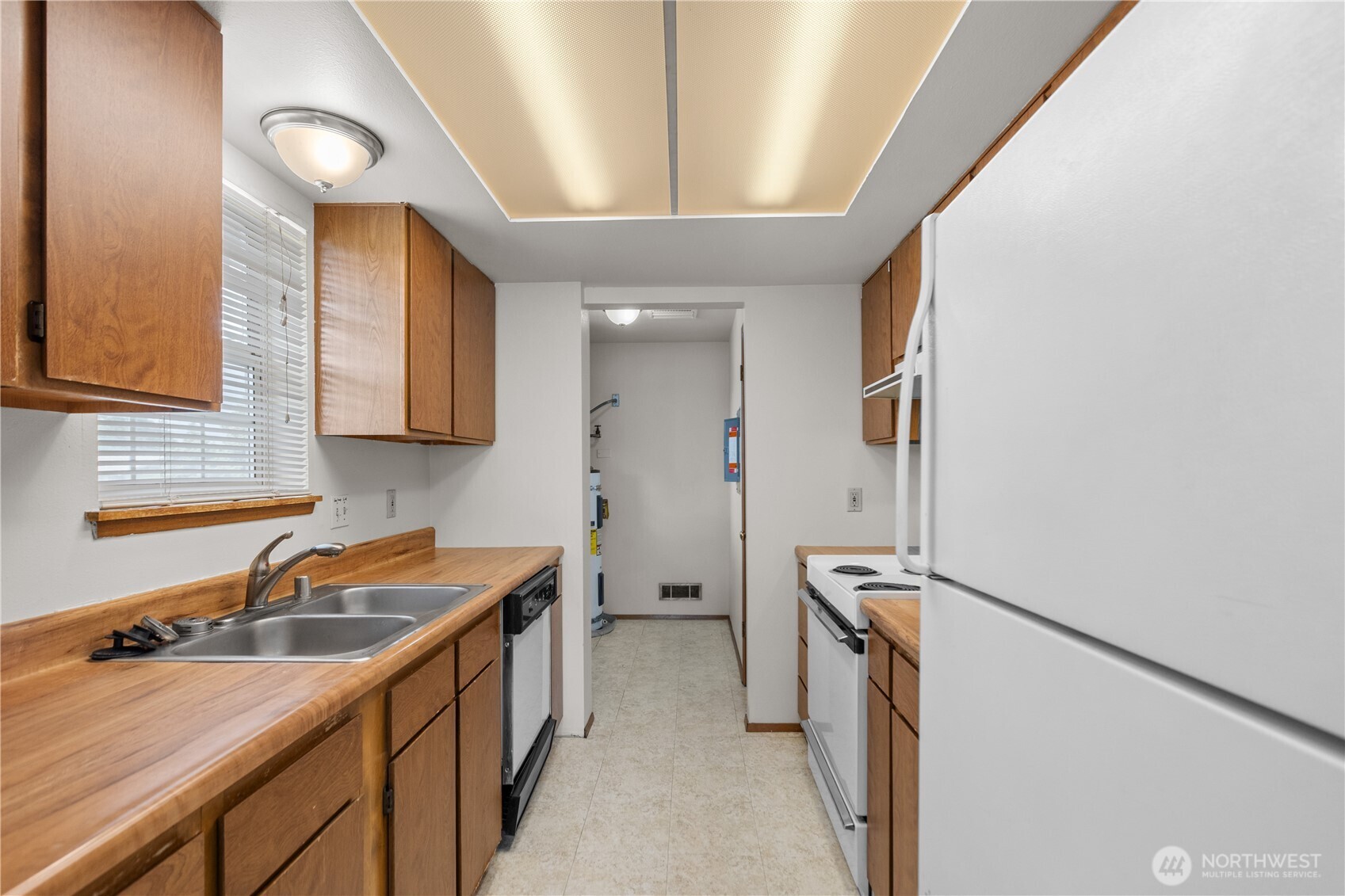 2312 Jade Avenue Everett, WA 98201 - Photo 20 of 34 a kitchen with a sink appliances and cabinets